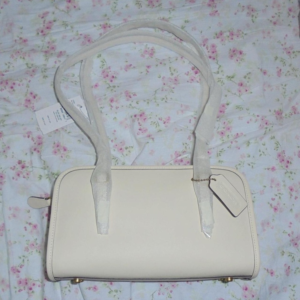 coach swing zip bag in “chalk”